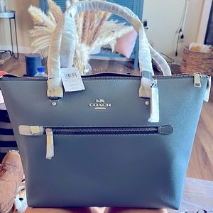 Indigo Coach bag Never used,pristine condition 6inx5inx 2.5